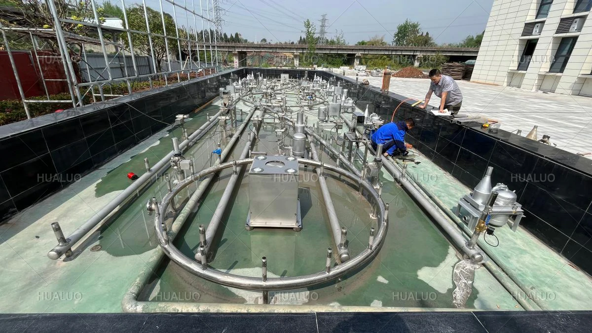 Technicians providing on-site guidance and installing fountain equipment.